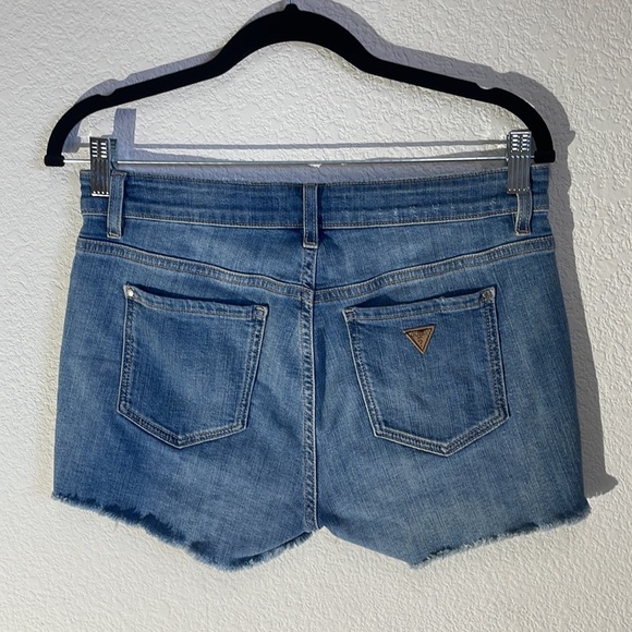 Guess Medium Wash Distressed Denim Short
Style # WB1D10D26I0 - Picture 2 of 6
